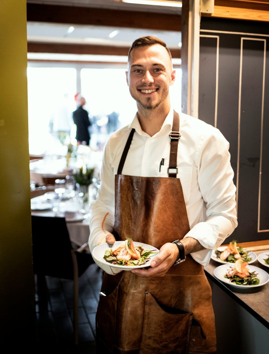 Professional portrait of a Danish male staff photographer
