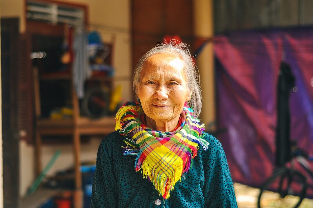 Portrait of an elderly Danish woman looking out a window